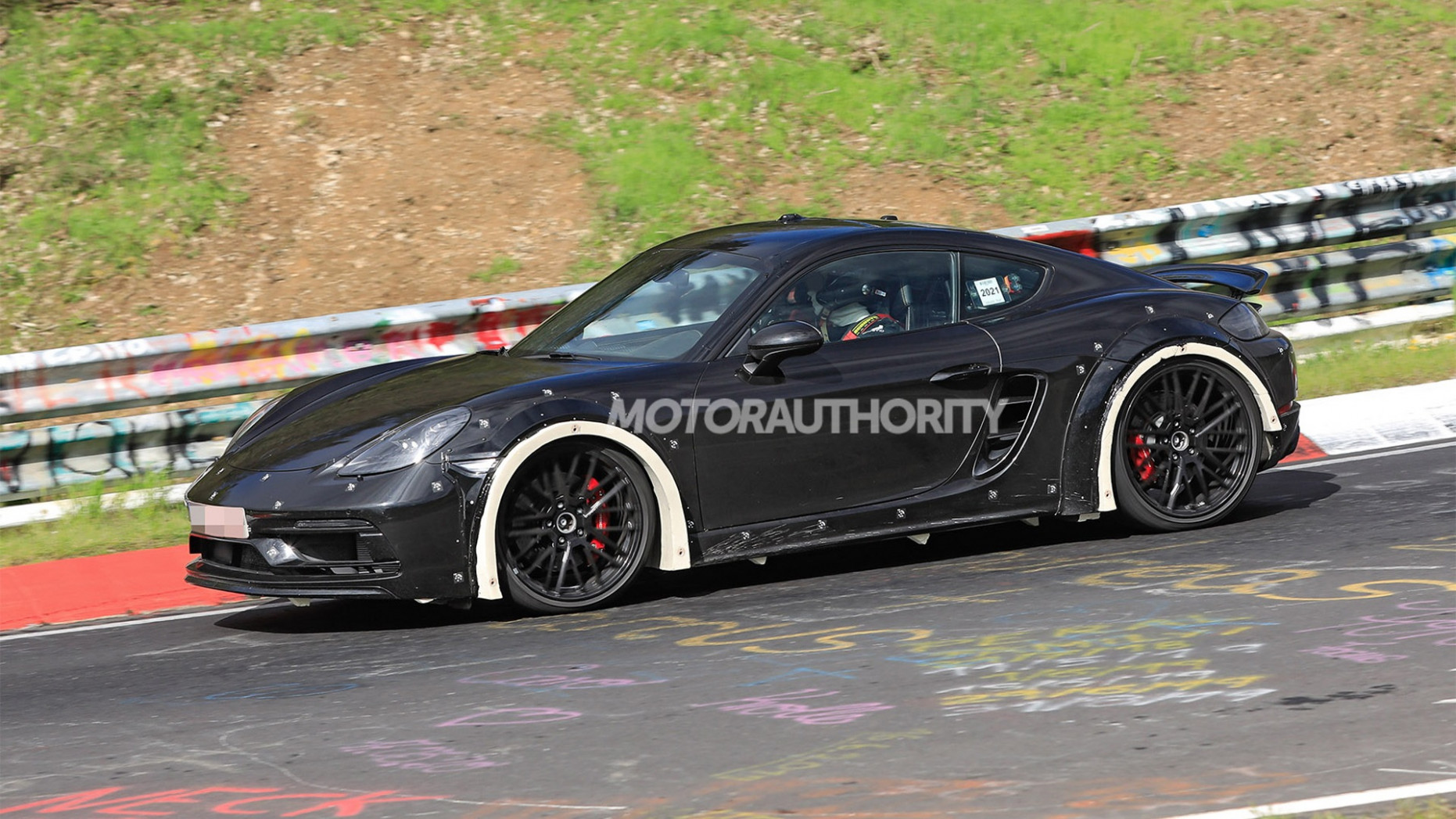 11 Porsche 11 Cayman spy shots: Redesign in the works - 2024 Porsche 718
